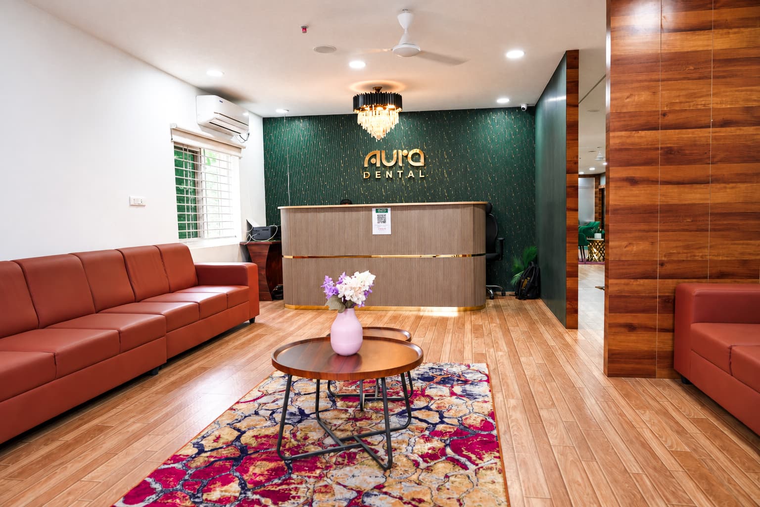 Reception and waiting area inside the Aura Dental clinic in Madinaguda, Hyderabad